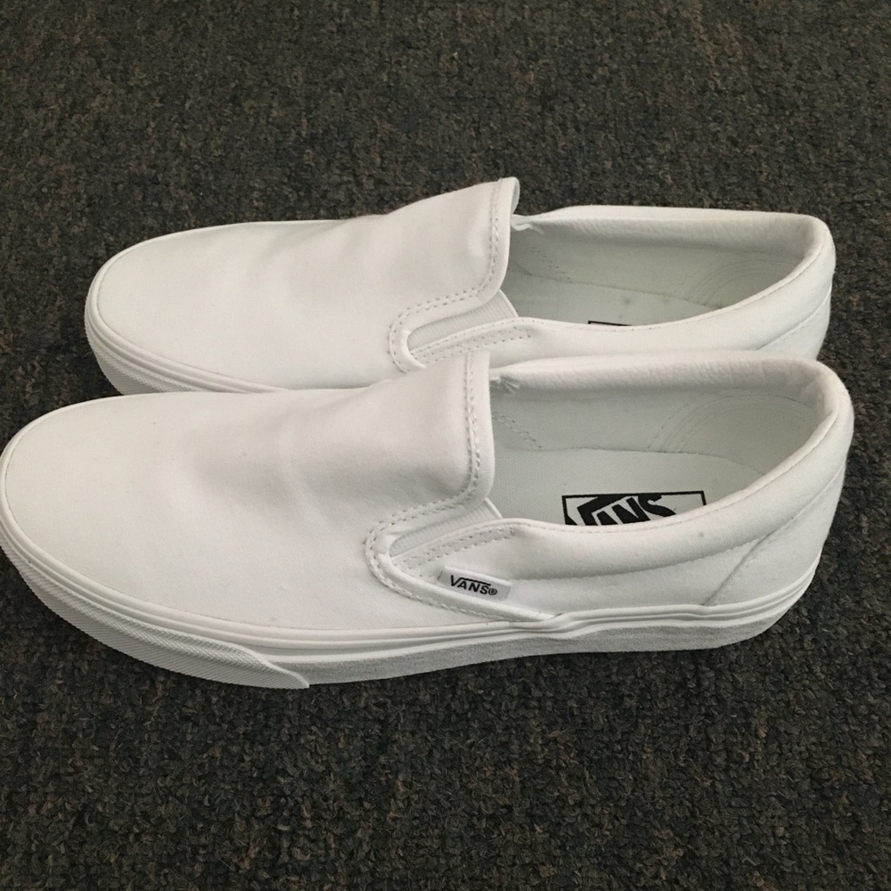 all white slip on vans